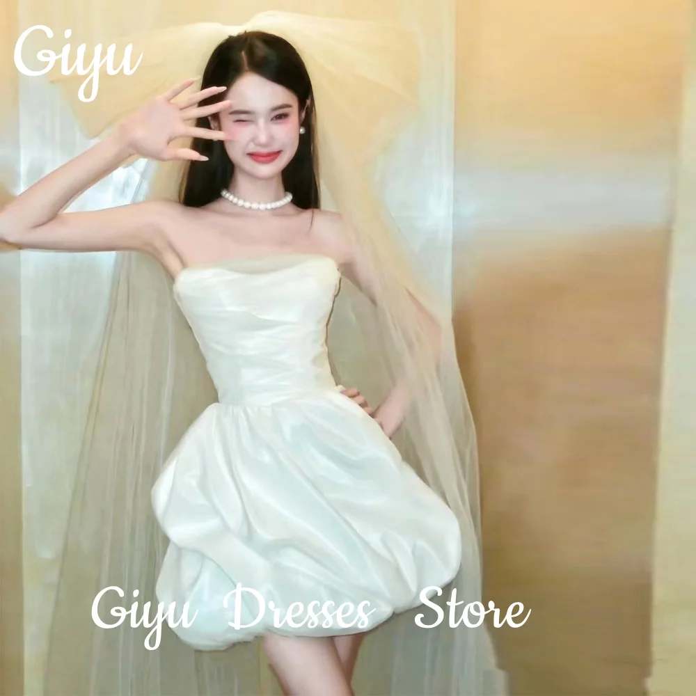 Giyu Fairy Satin A Line Короткие корейские свадебные платья без рукавов из тафты со складками выше колена Мини-свадебные платья с корсетом сзади 웨딩드레스 2025
Giyu Fairy Satin A Line Короткие корейские свадебные платья без рукавов из тафты со складками выше колена Мини-свадебные платья с корсетом сзади 웨딩드레스 2025