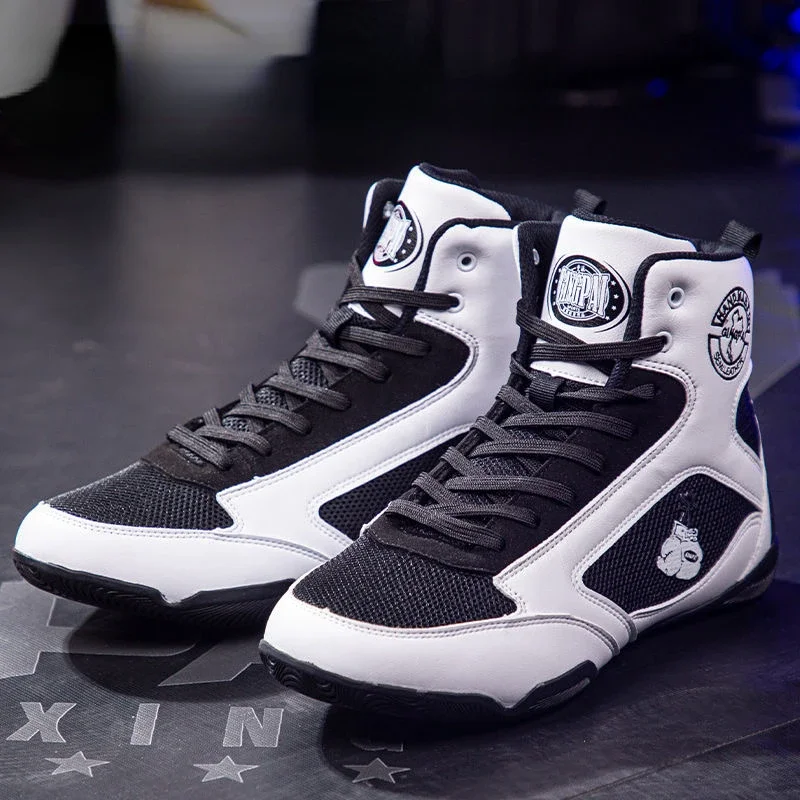 New Arrival Boxing Fighting Boots Black White Wrestling Boots Men Women Breathable Fighting Shoes Couples Luxury Brand Gym Shoe
New Arrival Boxing Fighting Boots Black White Wrestling Boots Men Women Breathable Fighting Shoes Couples Luxury Brand Gym Shoe