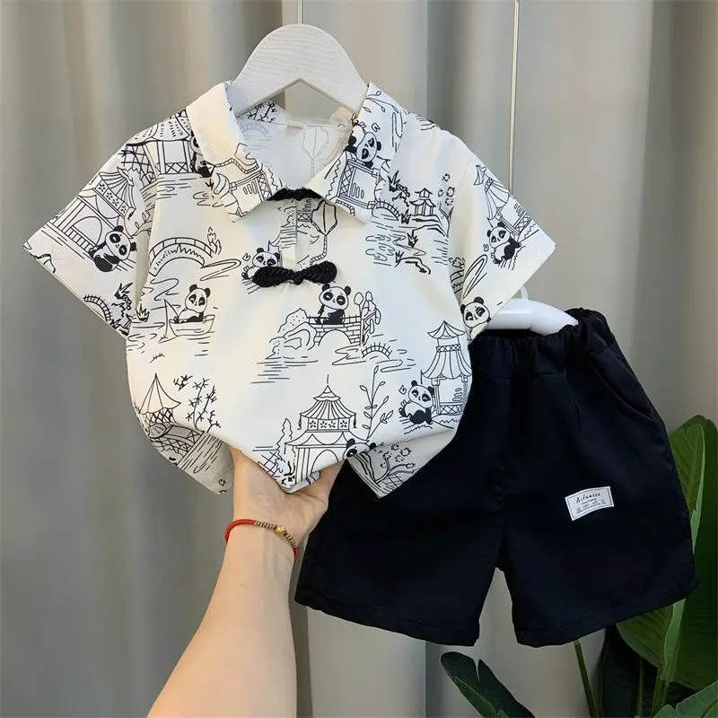 Summer New Boys Turn-down Collar Printed Cartoon Pan Button Chinese Style Chic Fashionable Loose Short Sleeve Elastic Shorts Set
Summer New Boys Turn-down Collar Printed Cartoon Pan Button Chinese Style Chic Fashionable Loose Short Sleeve Elastic Shorts Set