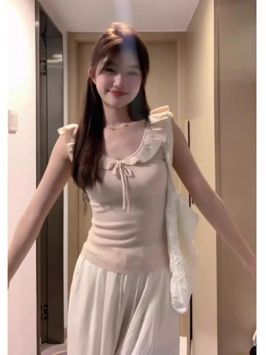 Slim Fit V-Neck Sleeveless Knitted T-Shirt Women's Summer New Style Thin Knot Chiffon Fiber Top French Style Soft
Slim Fit V-Neck Sleeveless Knitted T-Shirt Women's Summer New Style Thin Knot Chiffon Fiber Top French Style Soft