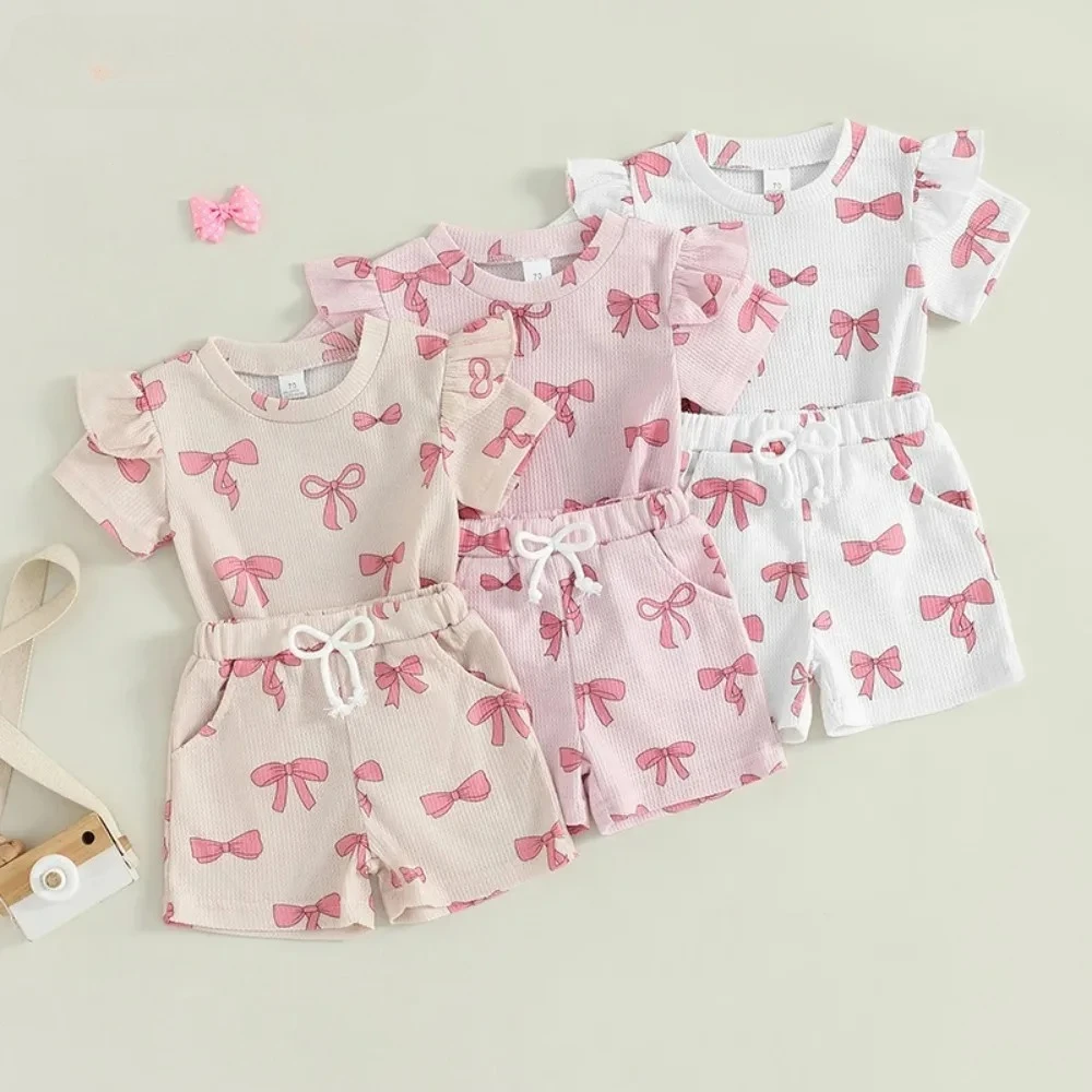Комплект одежды для маленьких девочек, новинка 2025, летняя повседневная детская одежда, домашняя одежда, топ с короткими рукавами и принтом банта + шорты, костюм из двух предметов
Комплект одежды для маленьких девочек, новинка 2025, летняя повседневная детская одежда, домашняя одежда, топ с короткими рукавами и принтом банта + шорты, костюм из двух предметов