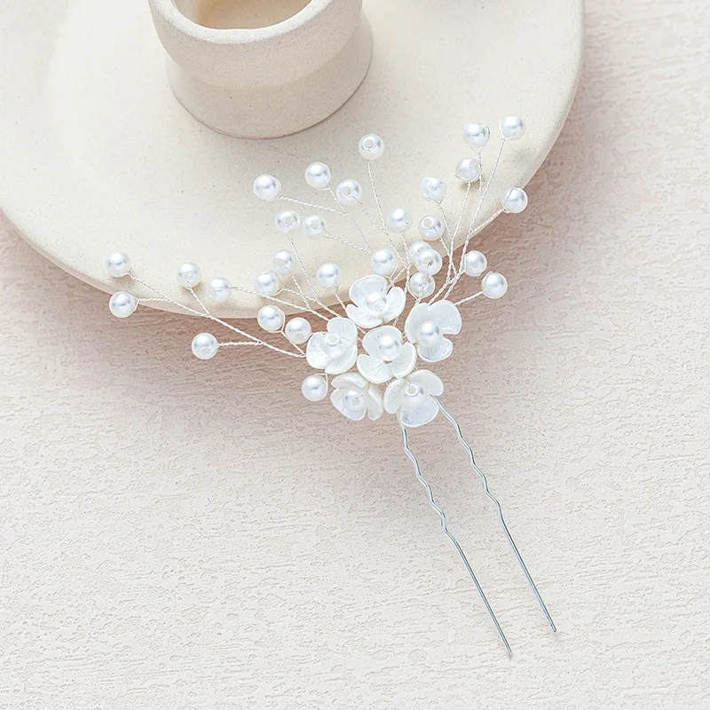 Модные заколки для волос невесты с жемчугом и цветком для женщин, свадебная тиара, украшения на голову, головной убор, заколка для волос, аксессуары для волос, ювелирные изделия
Модные заколки для волос невесты с жемчугом и цветком для женщин, свадебная тиара, украшения на голову, головной убор, заколка для волос, аксессуары для волос, ювелирные изделия