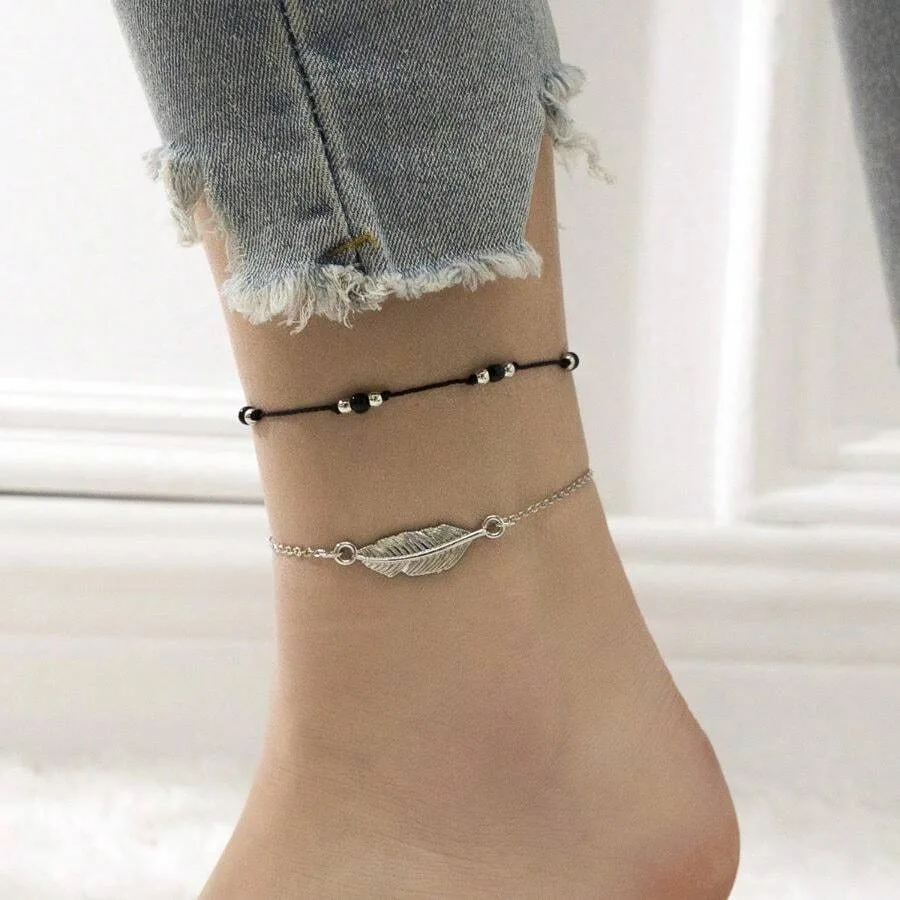 European And American Woven Anklets, Personalized And Fashionable Gold Leaf Pendants, Two-Piece Set Of Foot Accessories
European And American Woven Anklets, Personalized And Fashionable Gold Leaf Pendants, Two-Piece Set Of Foot Accessories