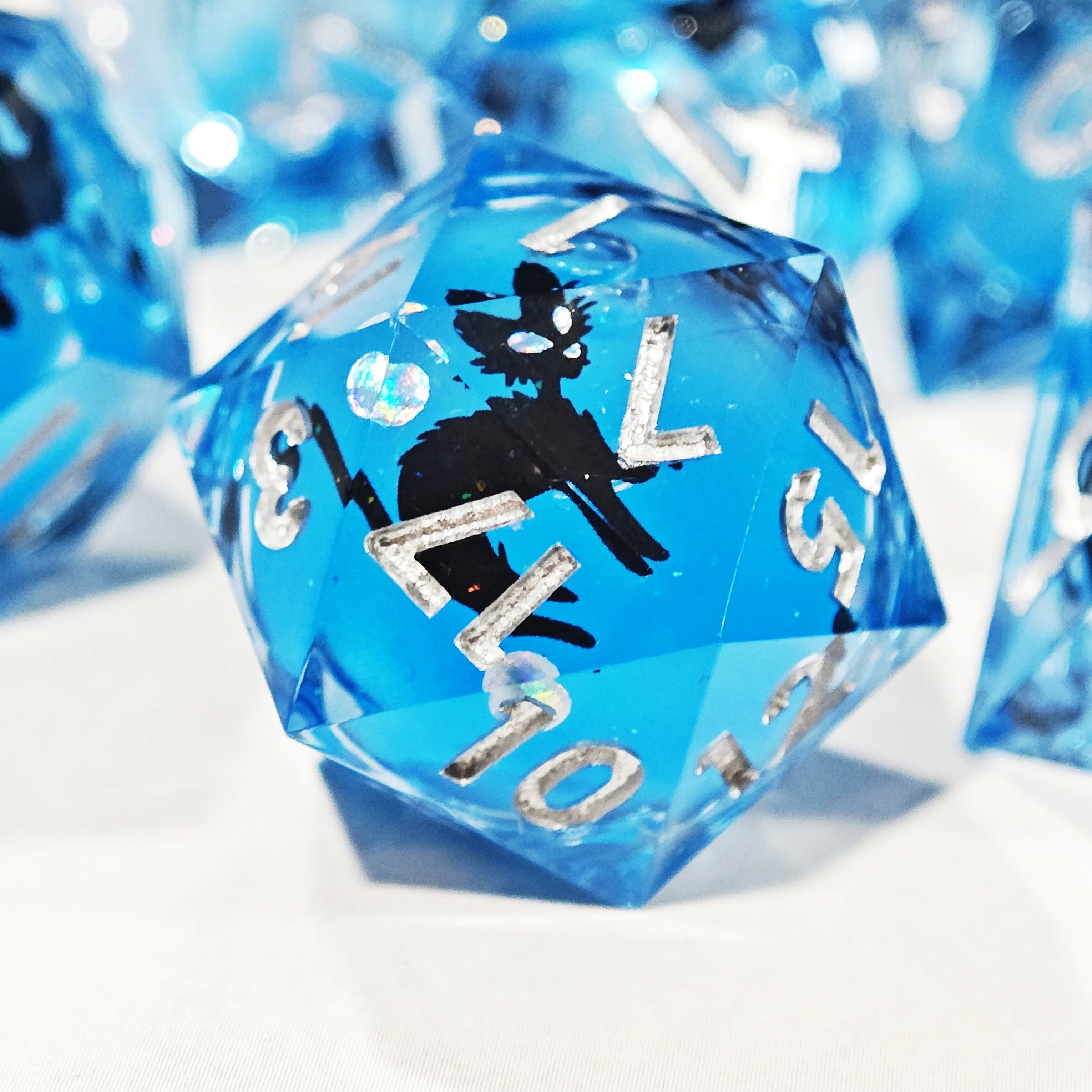 MINI PLANET Black Cat Enigma Liquid Core Dice Set for RPG Board Game DND Dice Set Sharp Handmade Resin Dice Box Sets 7pcs/set
MINI PLANET Black Cat Enigma Liquid Core Dice Set for RPG Board Game DND Dice Set Sharp Handmade Resin Dice Box Sets 7pcs/set