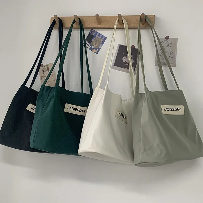 Simple Bucket Bags Nylon Waterproof Single Shoulder Japanese Harajuku Nylon Handbag Messenger Bag
Simple Bucket Bags Nylon Waterproof Single Shoulder Japanese Harajuku Nylon Handbag Messenger Bag
