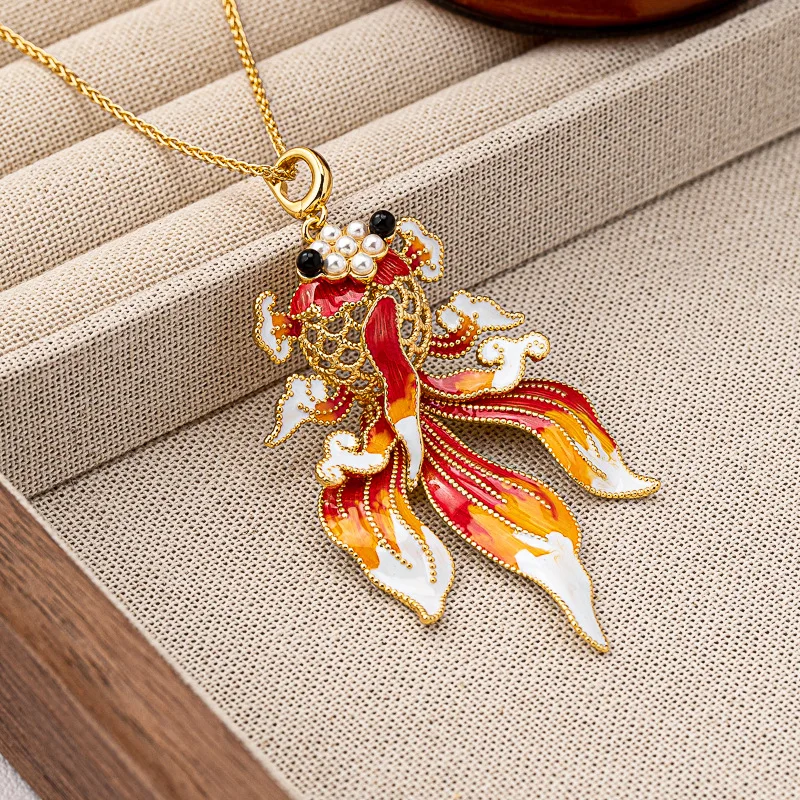 New Chinese Style Oil-dripping Pearl Hollow Goldfish Necklace Fashionable Exaggerated Style Light Luxury High-end Sweater Chain
New Chinese Style Oil-dripping Pearl Hollow Goldfish Necklace Fashionable Exaggerated Style Light Luxury High-end Sweater Chain
