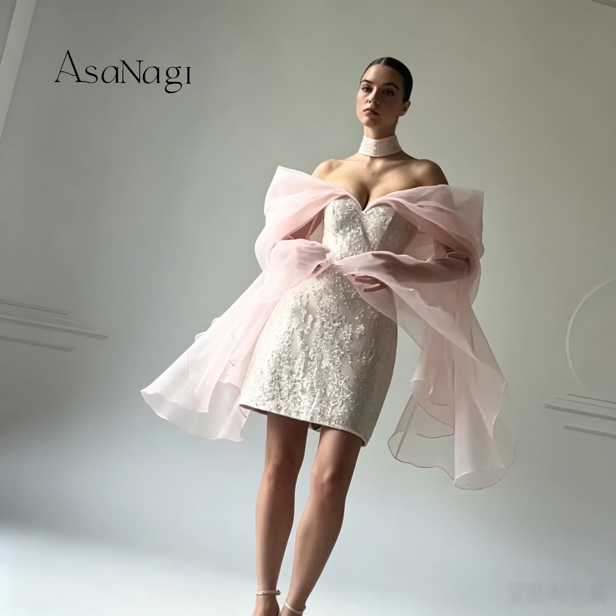 French-style lightweight off-the-shoulder A-line mini dress with a butterfly ribbon bodice and exquisite sequin design.
French-style lightweight off-the-shoulder A-line mini dress with a butterfly ribbon bodice and exquisite sequin design.