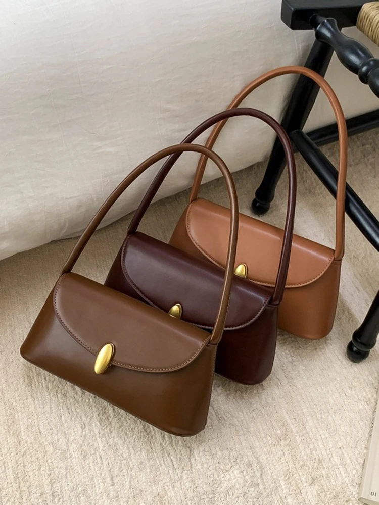 Vintage Texture PU Leather Shoulder Bag Women Classic Fashion Solid Color Commuting Underarm Bag Office Ladies Elegant Handbags
Vintage Texture PU Leather Shoulder Bag Women Classic Fashion Solid Color Commuting Underarm Bag Office Ladies Elegant Handbags