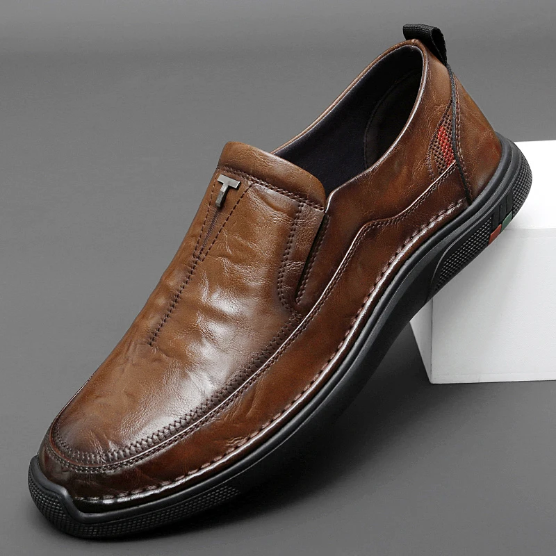 Итальянская брендовая мужская кожаная повседневная обувь, коричневая прогулочная обувь в стиле ретро, удобная мужская деловая рабочая обувь на мягкой подошве
Итальянская брендовая мужская кожаная повседневная обувь, коричневая прогулочная обувь в стиле ретро, удобная мужская деловая рабочая обувь на мягкой подошве