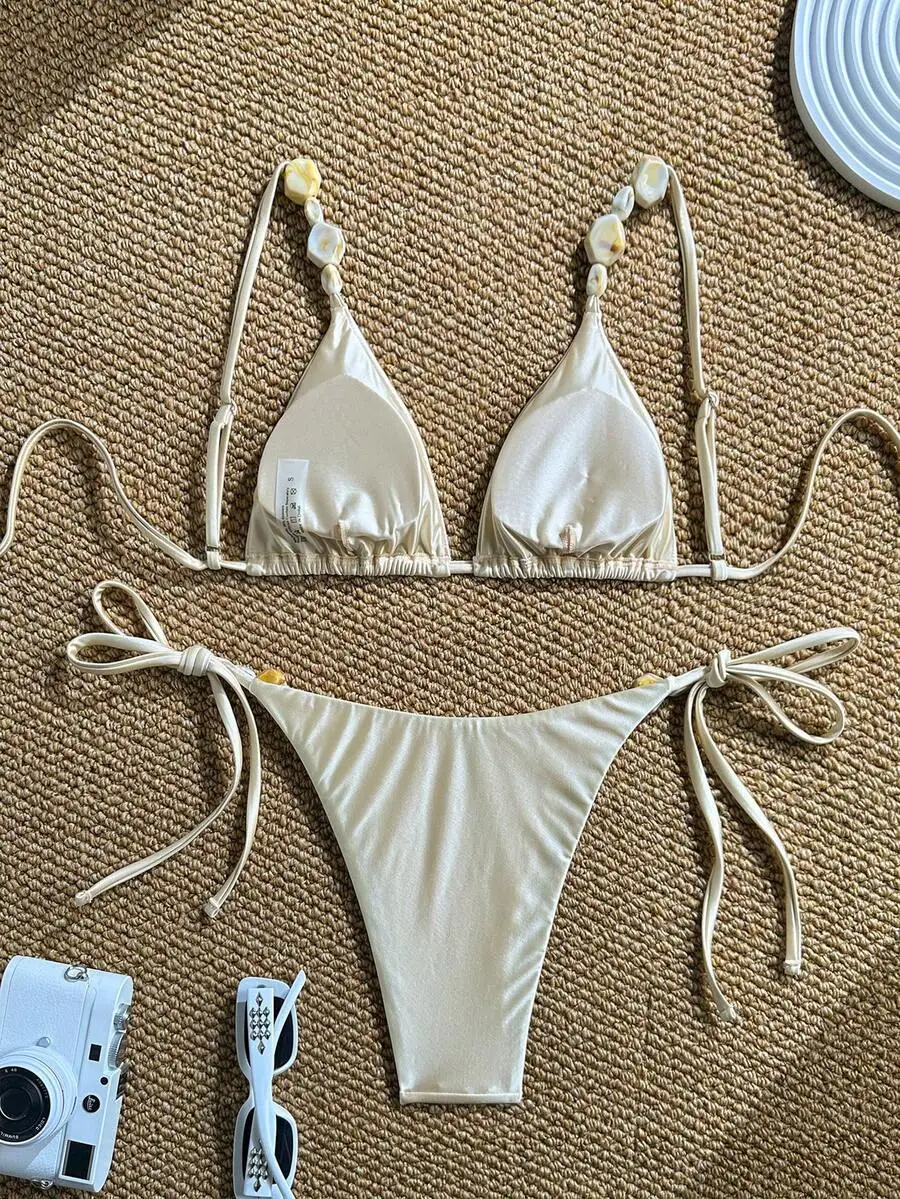 Elegant Beaded Solid Color Spaghetti Strap High Waist Bikini Set
Elegant Beaded Solid Color Spaghetti Strap High Waist Bikini Set
