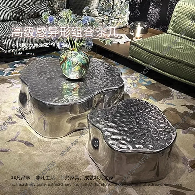 Italian light luxury high-end special-shaped designer style artistic sense simplicity living room stainless steel tea table
Italian light luxury high-end special-shaped designer style artistic sense simplicity living room stainless steel tea table