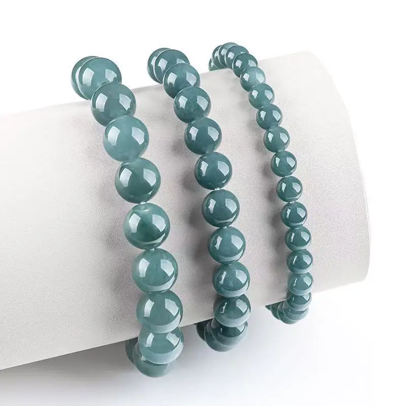 Myanmar A Blue Beaded Bracelet with Round and Icy Jadeite Beads
Myanmar A Blue Beaded Bracelet with Round and Icy Jadeite Beads