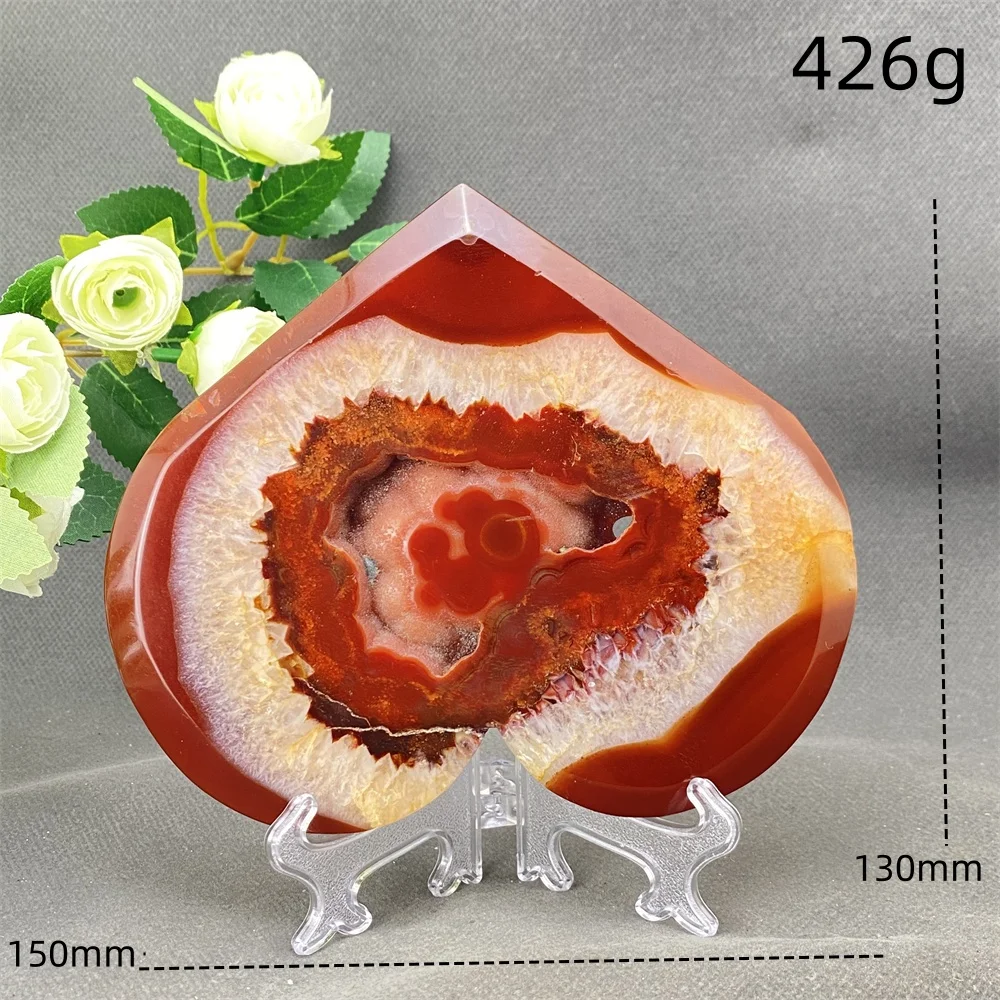A natural Red Agate Crystal Heart Symbolizes Love Aura Meditation Chakra Home Decoration Ornaments.
A natural Red Agate Crystal Heart Symbolizes Love Aura Meditation Chakra Home Decoration Ornaments.