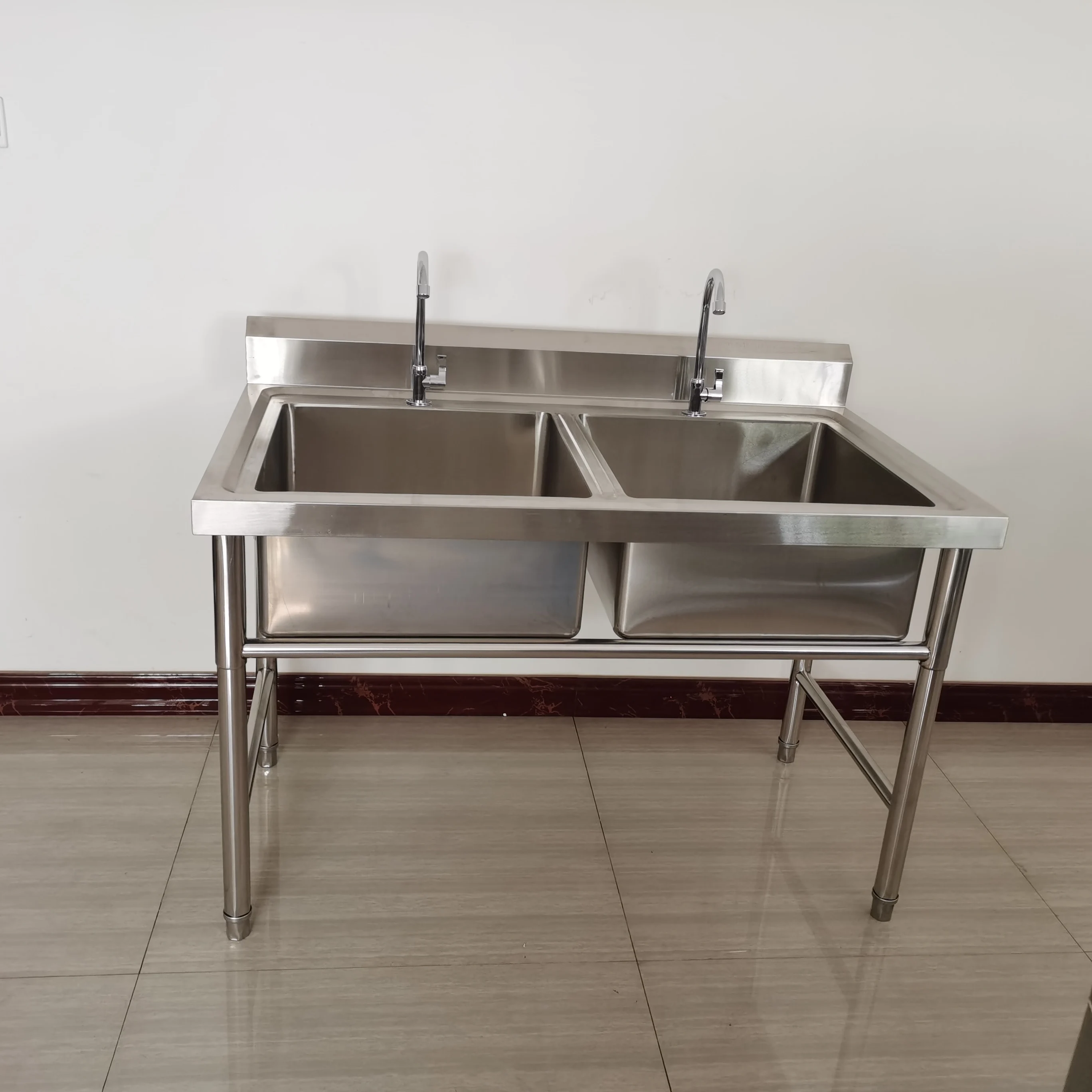 Hotel Restaurant Use Stainless Steel Double Bowl Sink Self-Cleaning Coating Heavy-Duty Capacity Freestanding Commercial Kitchen
Hotel Restaurant Use Stainless Steel Double Bowl Sink Self-Cleaning Coating Heavy-Duty Capacity Freestanding Commercial Kitchen
