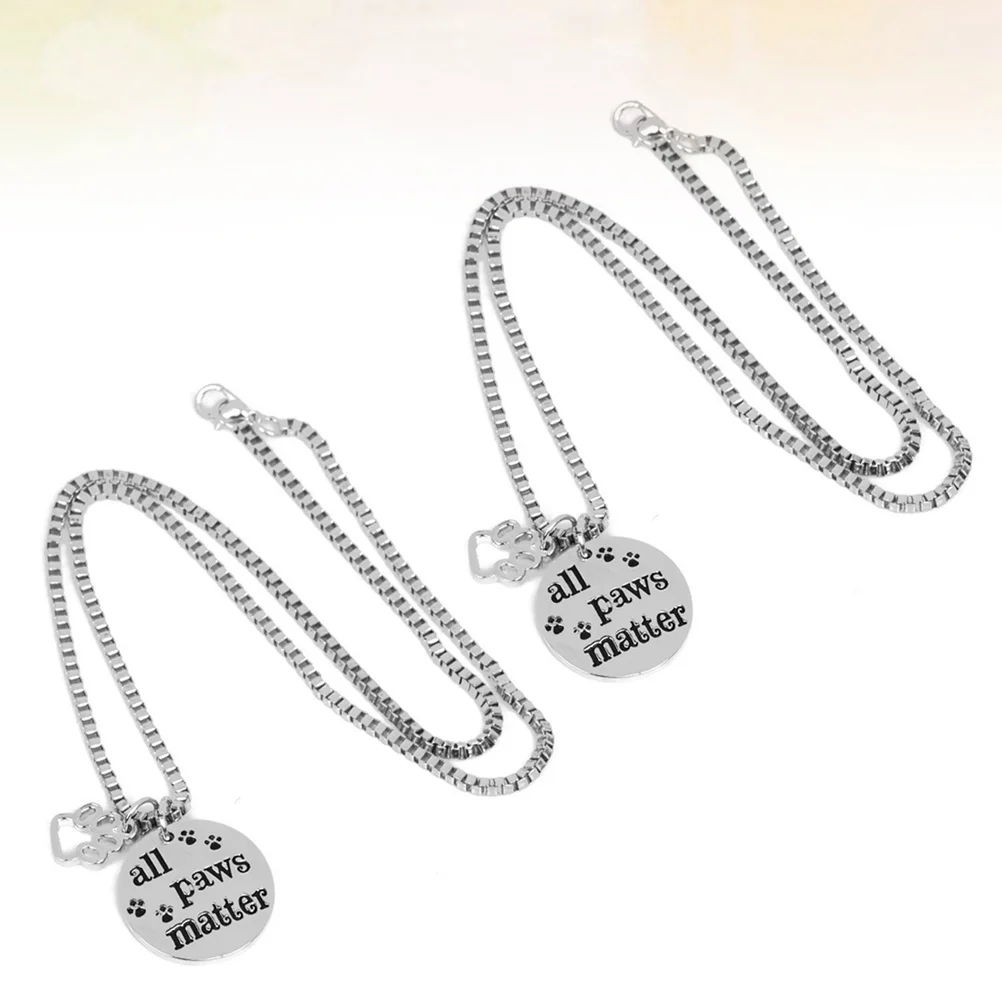 2 pcs Dog Tag Necklace Set All Matter Letter Carved Hollow Footprint Design Durable Pet Neck Chain For Small Dog Daily Wear
2 pcs Dog Tag Necklace Set All Matter Letter Carved Hollow Footprint Design Durable Pet Neck Chain For Small Dog Daily Wear