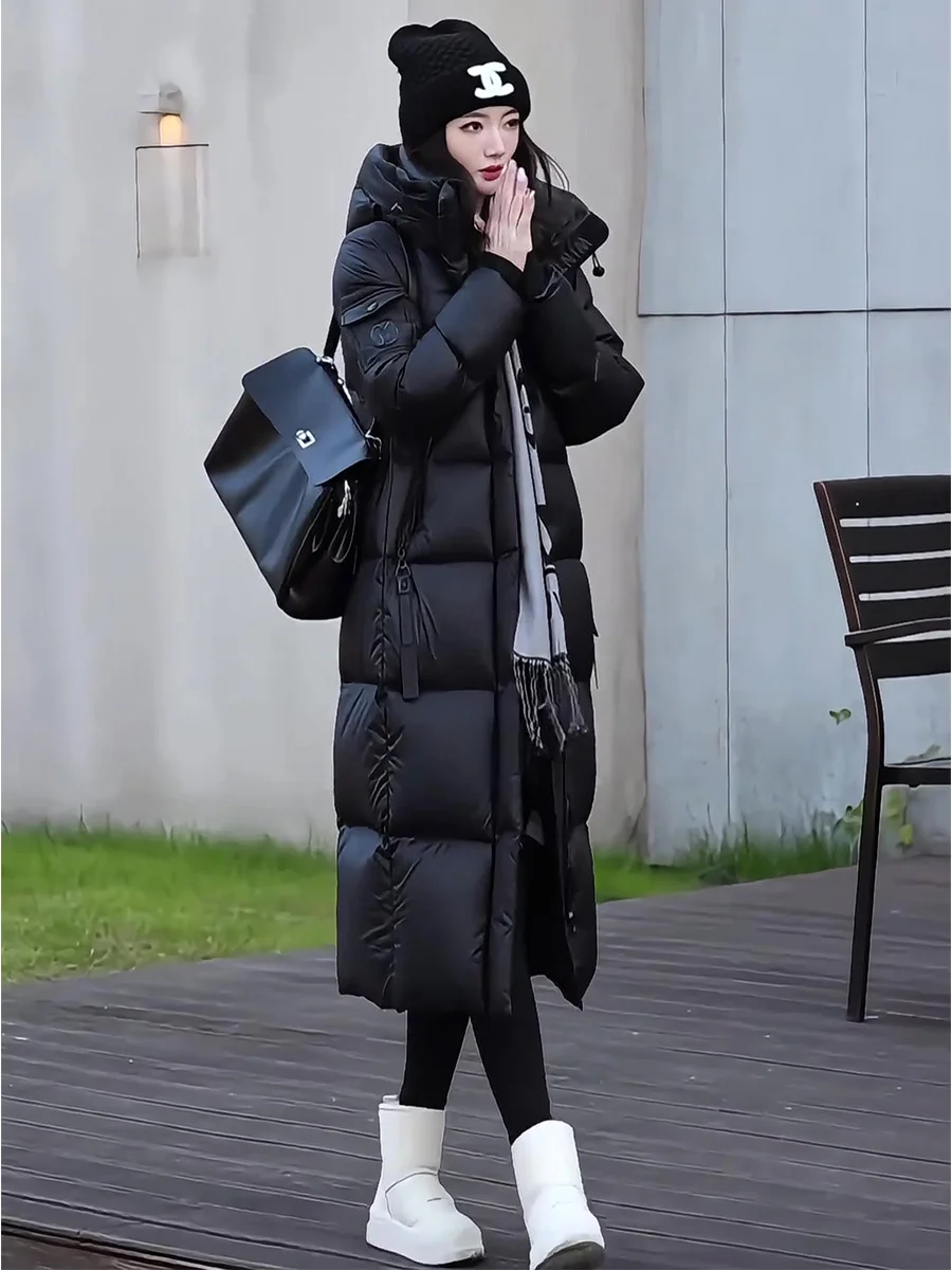 Модное длинное пуховое пальто выше колена для женщин, утепленное, теплое, с белым пухом, зимнее, повседневное, с карманами
Модное длинное пуховое пальто выше колена для женщин, утепленное, теплое, с белым пухом, зимнее, повседневное, с карманами