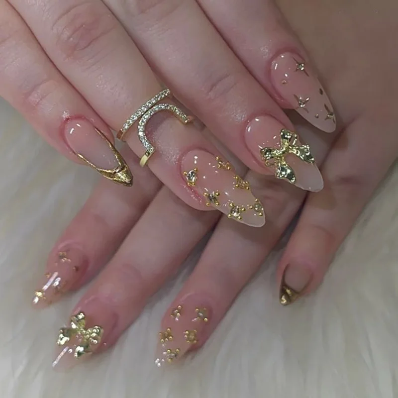 24Pcs Gold French False Nails Ins Nude Pink Almond Press On Nails with 3D Gold Bowknot Design For Party Daily Wearable Fake Nail
24Pcs Gold French False Nails Ins Nude Pink Almond Press On Nails with 3D Gold Bowknot Design For Party Daily Wearable Fake Nail