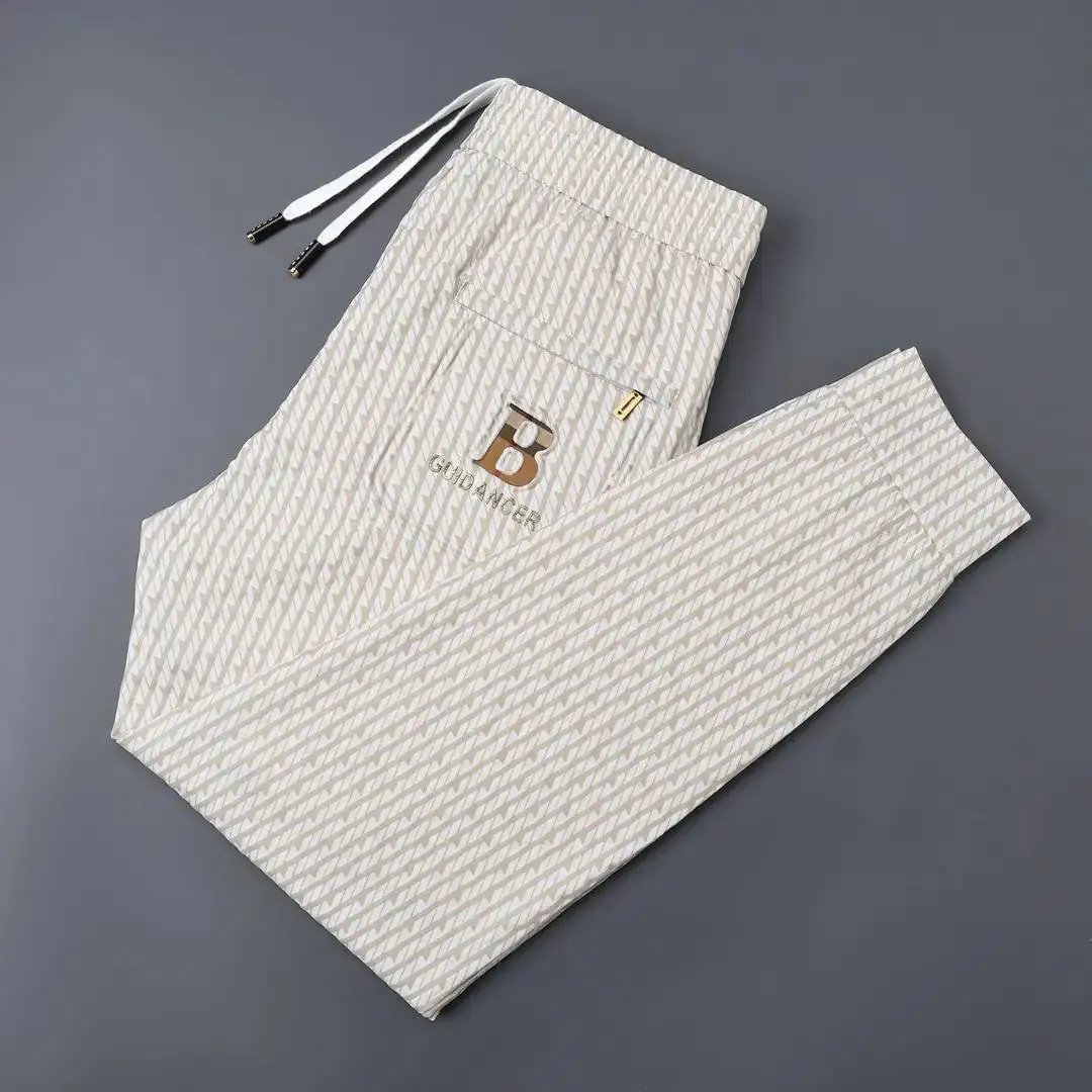 Light luxury European new thin men's casual pants slim trend milk silk leggings business embroidery pants
Light luxury European new thin men's casual pants slim trend milk silk leggings business embroidery pants