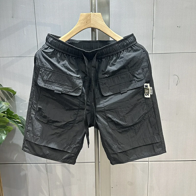 Мужские летние повседневные пляжные брюки из тонкого ледяного шелка пять четвертей, прямые брюки для спецодежды с большими кетами Qui Dry
Мужские летние повседневные пляжные брюки из тонкого ледяного шелка пять четвертей, прямые брюки для спецодежды с большими кетами Qui Dry