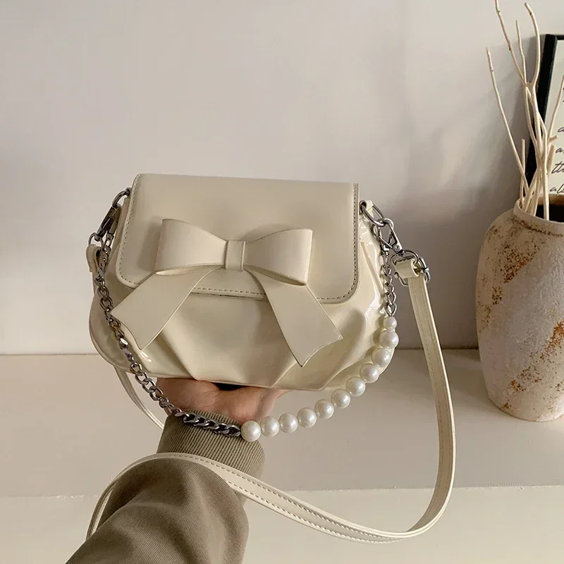Fashion Bow High Quality PU Shoulder Bags Simple Versatile Sense of Luxury Commute Style Handbags for Women 2025 Hot Sale
Fashion Bow High Quality PU Shoulder Bags Simple Versatile Sense of Luxury Commute Style Handbags for Women 2025 Hot Sale