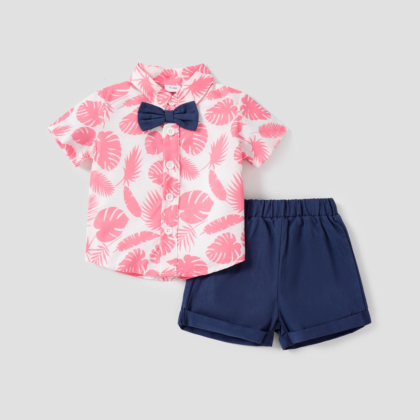 PatPat 2pcs Baby Boy Allover Pink Leaf Print Short-sleeve Bow Tie Shirt and Solid Shorts Set
PatPat 2pcs Baby Boy Allover Pink Leaf Print Short-sleeve Bow Tie Shirt and Solid Shorts Set