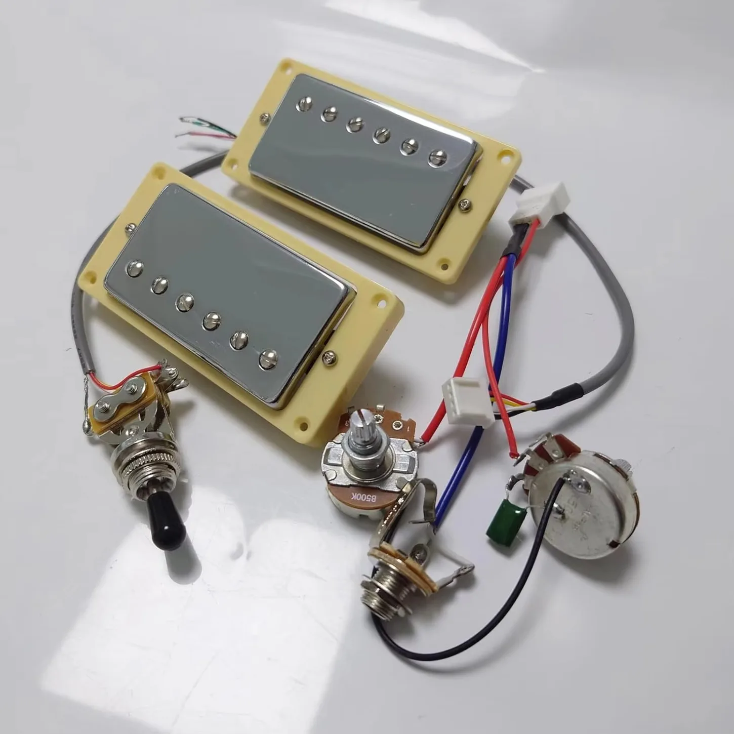 Guitar Alnico 5 Humbucker Pickup Set with 1V1T Wiring Harness 4 Conductor Neck Bridge for LP SG Style Electric Guitar Parts
Guitar Alnico 5 Humbucker Pickup Set with 1V1T Wiring Harness 4 Conductor Neck Bridge for LP SG Style Electric Guitar Parts