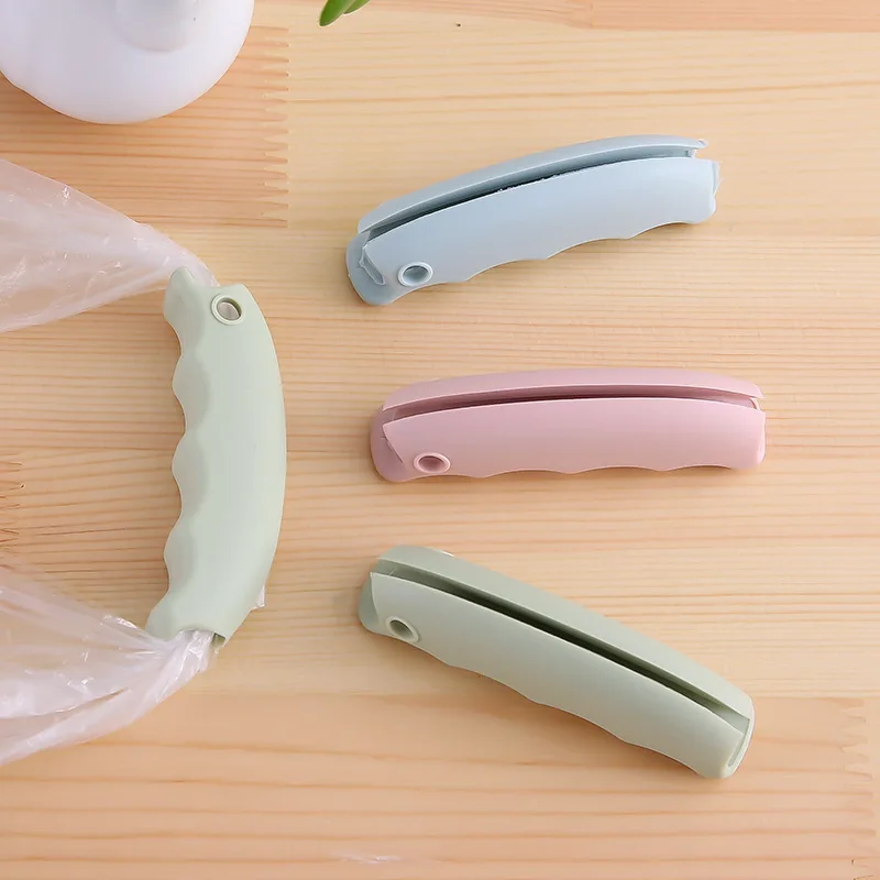 Silicone anti pinch hand effortless vegetable picker plastic bag handle
Silicone anti pinch hand effortless vegetable picker plastic bag handle