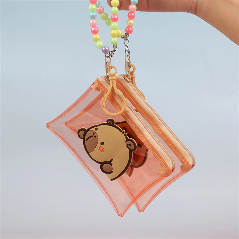 Cartoon Capybara Transparent PVC Coin Purse Mini Earphone Storage Bag with Bead Chain Card Organizer Portable Zipper Wallet
Cartoon Capybara Transparent PVC Coin Purse Mini Earphone Storage Bag with Bead Chain Card Organizer Portable Zipper Wallet