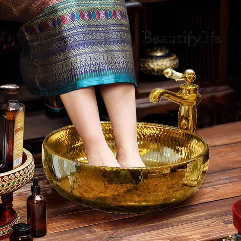 Thai spa hotel clubhouse foot bath bucket foot bath bucket golden foot bath ceramic table basin
Thai spa hotel clubhouse foot bath bucket foot bath bucket golden foot bath ceramic table basin