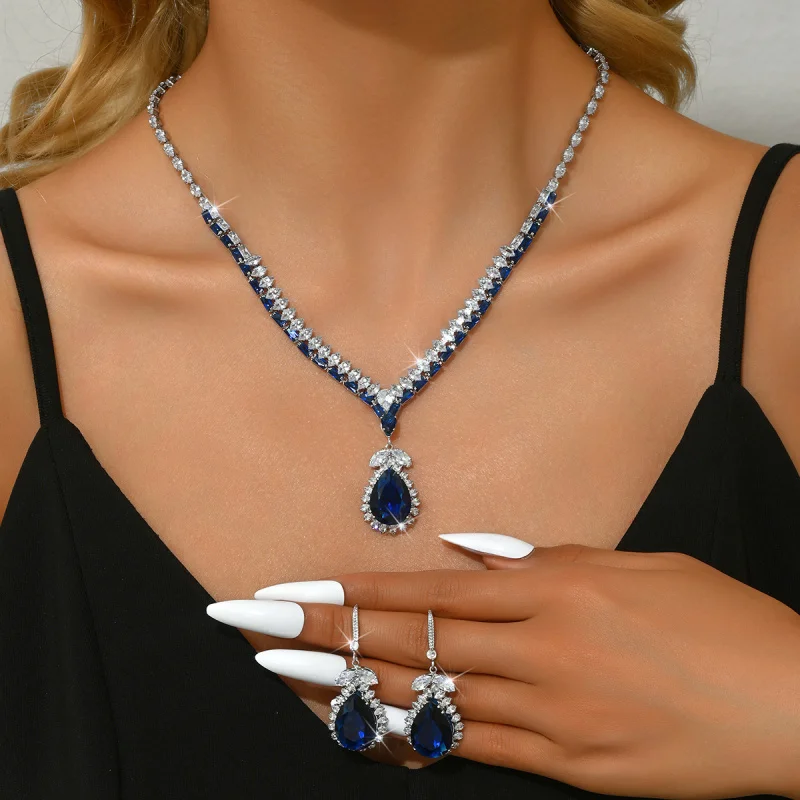 New European and American Style Royal Blue Earrings Water Drop Pendant Fashion Bride Accessories Zircon Necklace Jewelry Wedding
New European and American Style Royal Blue Earrings Water Drop Pendant Fashion Bride Accessories Zircon Necklace Jewelry Wedding