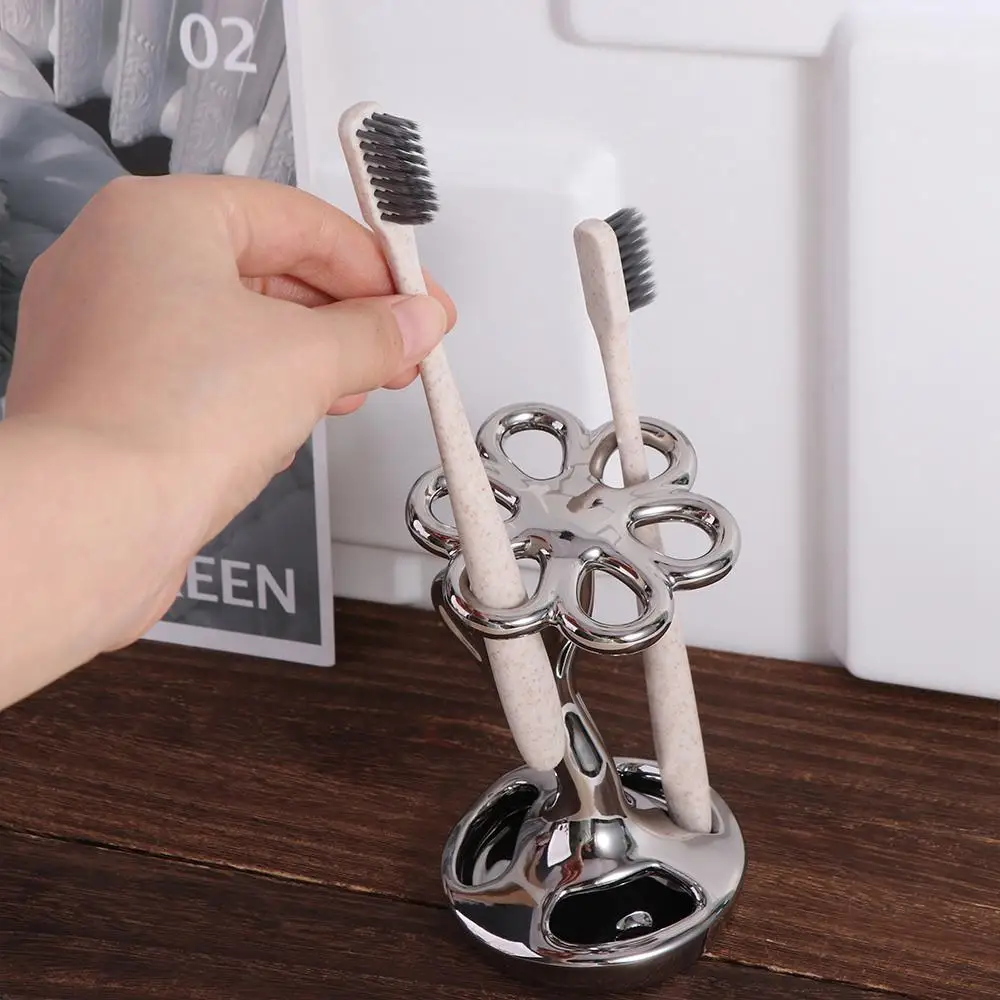 Flower Shaped Ceramic Toothbrush Holder Space Saving 6 Slots Tooth Brush Storage Racks Anti-slip Water-proof Toothpaste Stand
Flower Shaped Ceramic Toothbrush Holder Space Saving 6 Slots Tooth Brush Storage Racks Anti-slip Water-proof Toothpaste Stand