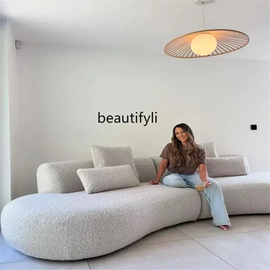 CC Italian minimalist light luxury curved fabric sofa designer casual simple sofa
CC Italian minimalist light luxury curved fabric sofa designer casual simple sofa