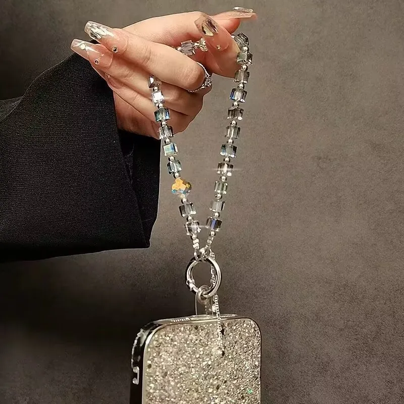 Роскошная блестящая хрустальная кисточка со звездами, прозрачные бусины, ручная цепочка на запястье, короткий ремешок с зажимом, чехол для мобильного телефона, брелок, подвесная цепочка
Роскошная блестящая хрустальная кисточка со звездами, прозрачные бусины, ручная цепочка на запястье, короткий ремешок с зажимом, чехол для мобильного телефона, брелок, подвесная цепочка
