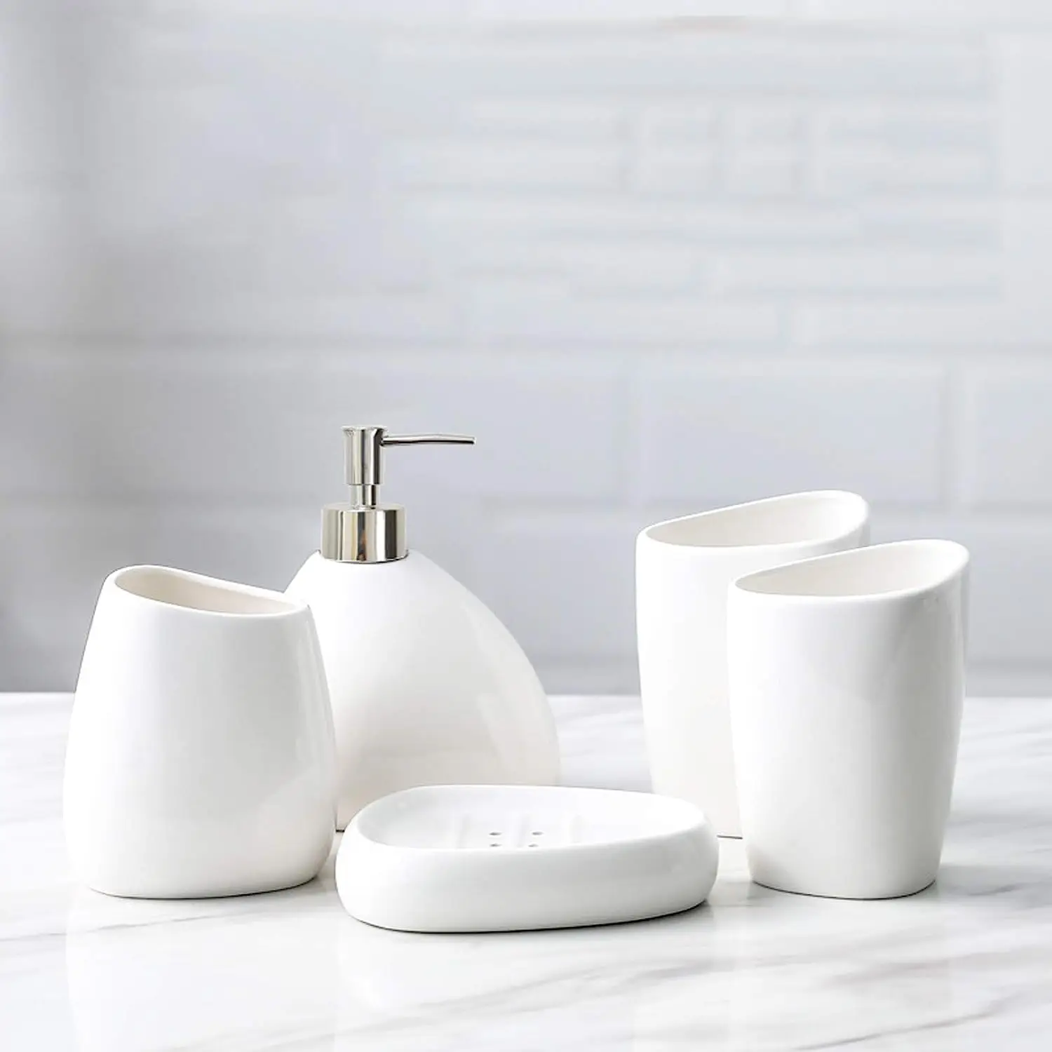 White Ceramic Bathroom Set: Soap Dispenser, Toothbrush Holder, Tumbler Cups, Soap Dish - 5 Pieces
White Ceramic Bathroom Set: Soap Dispenser, Toothbrush Holder, Tumbler Cups, Soap Dish - 5 Pieces
