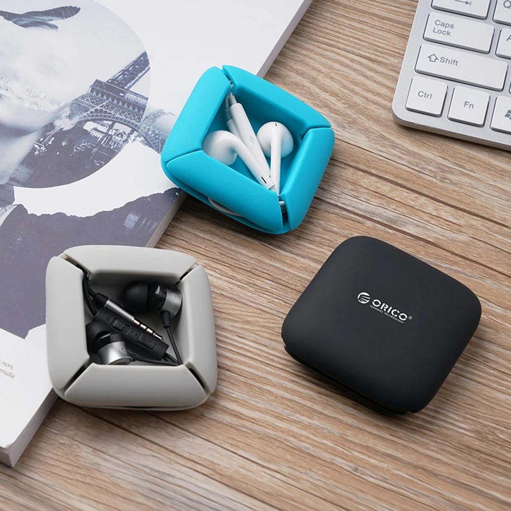 Multi Function Mobile Phone Data Cable Headphone Cable Winder Silicone Wire Take-up Storage Box(Black)
Multi Function Mobile Phone Data Cable Headphone Cable Winder Silicone Wire Take-up Storage Box(Black)
