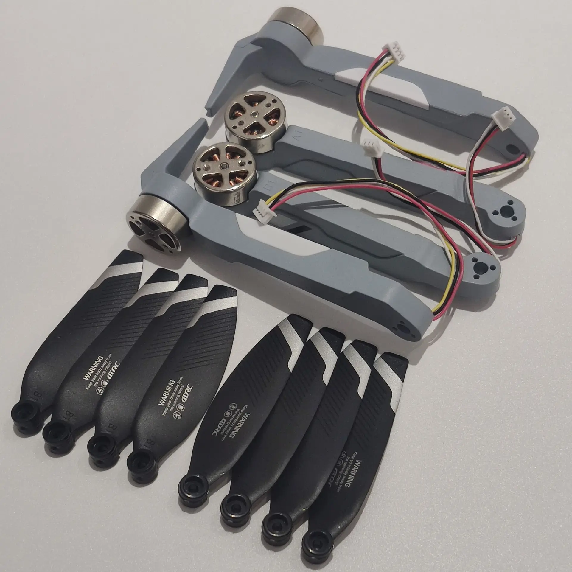 Spare Parts Brushless Motor Arm A1B1A2B2 4PCS + CW CCW Propeller Blade Accessories 8PCS for 4DRC M2S/4D-M2S Foldable RC Drones
Spare Parts Brushless Motor Arm A1B1A2B2 4PCS + CW CCW Propeller Blade Accessories 8PCS for 4DRC M2S/4D-M2S Foldable RC Drones