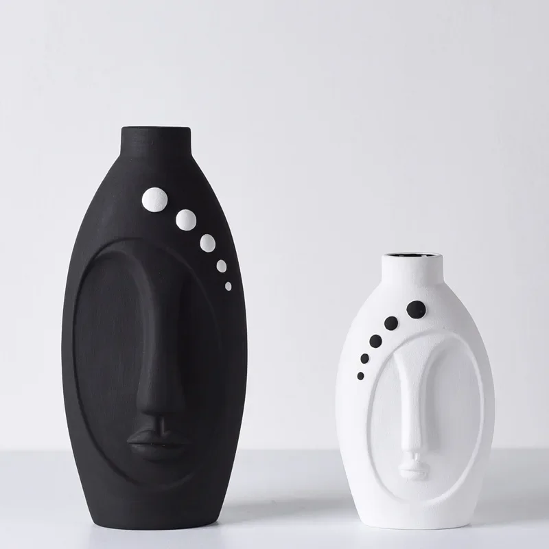 Nordic minimalist black and white face ceramic vase decoration hotel model room living room creative home soft decoration crafts
Nordic minimalist black and white face ceramic vase decoration hotel model room living room creative home soft decoration crafts