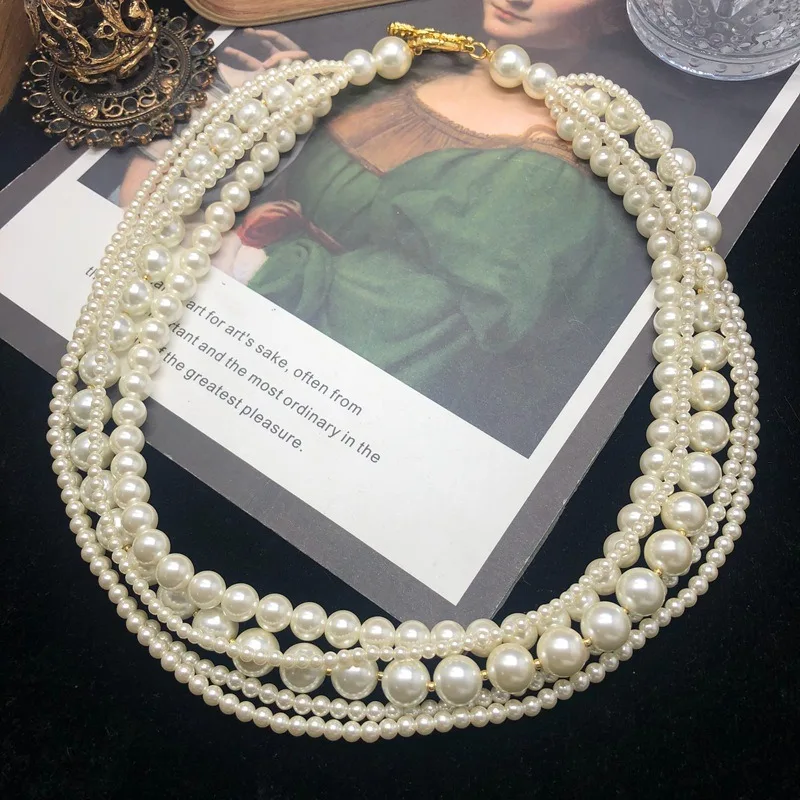 Retro Court Style Jewelry Multi-layer Glazed Pearl Beaded Short Necklace Classic Simple and Versatile Sweater Chain
Retro Court Style Jewelry Multi-layer Glazed Pearl Beaded Short Necklace Classic Simple and Versatile Sweater Chain