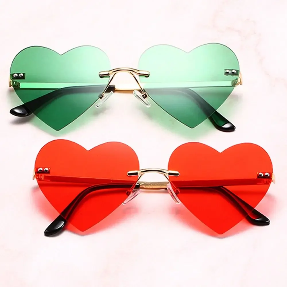 Trendy Party Cosplay Costume Heart-Shaped Pink Hippie Sunglasses Rimless Heart Sunglasses Metal Sun Glasses
Trendy Party Cosplay Costume Heart-Shaped Pink Hippie Sunglasses Rimless Heart Sunglasses Metal Sun Glasses