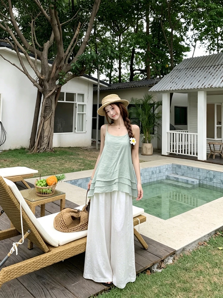 Summer 2026 Women's Loose Fit U-Neck Strap Vest High Waist Wide Leg Casual Pants Two-Piece Set Fashionable Korean Style
Summer 2026 Women's Loose Fit U-Neck Strap Vest High Waist Wide Leg Casual Pants Two-Piece Set Fashionable Korean Style