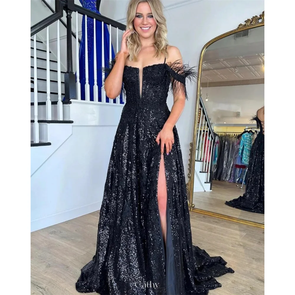Cathy Customized Black Glitter Feathered Side Split Prom Dress Spaghetti Strap vestidos de noiva A-line Floor-length Formal 2025
Cathy Customized Black Glitter Feathered Side Split Prom Dress Spaghetti Strap vestidos de noiva A-line Floor-length Formal 2025