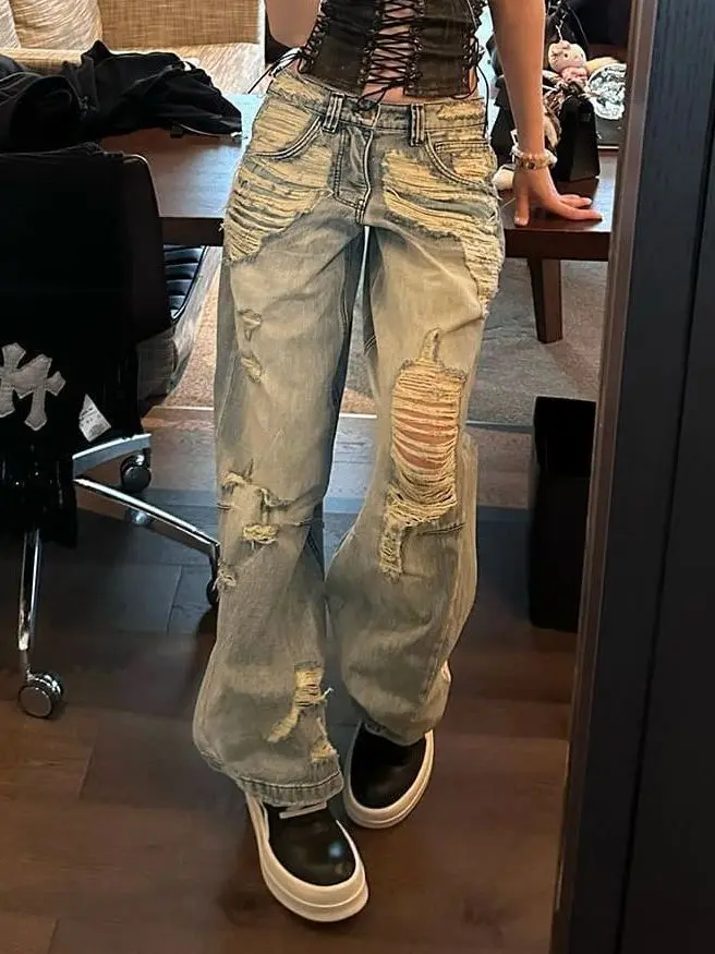 American high street ripped jeans women's design sense new Spice Girl loose vibe washed retro straight mopping pants
American high street ripped jeans women's design sense new Spice Girl loose vibe washed retro straight mopping pants