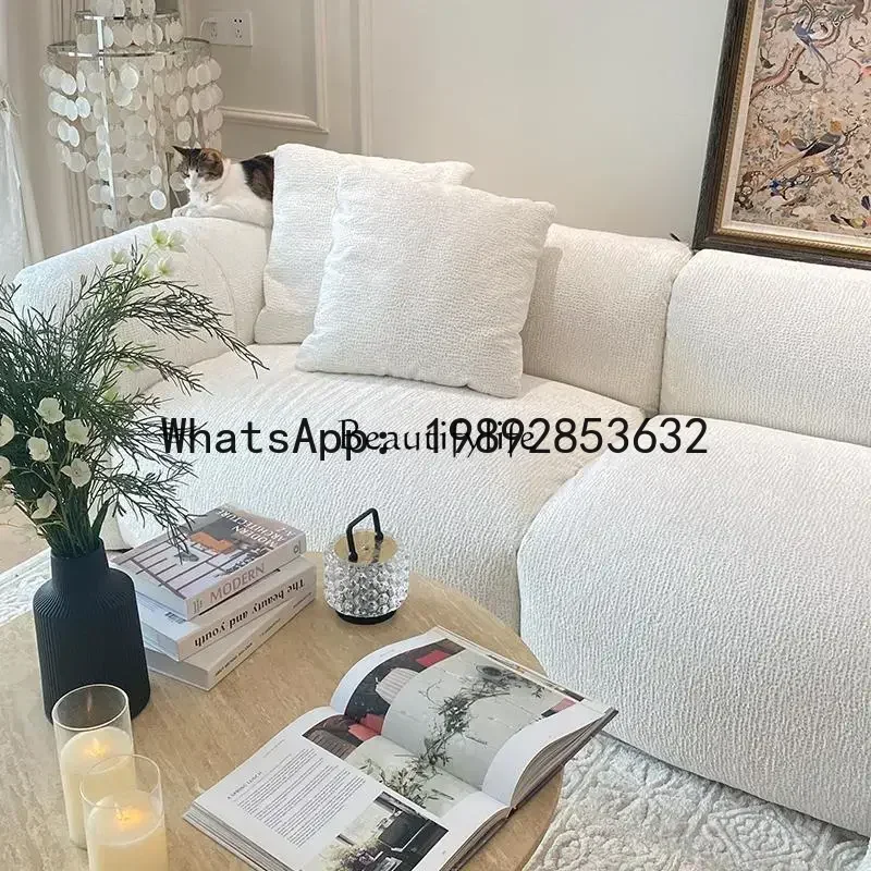 cream style retro living room simple straight row high-end fabric sofa
cream style retro living room simple straight row high-end fabric sofa