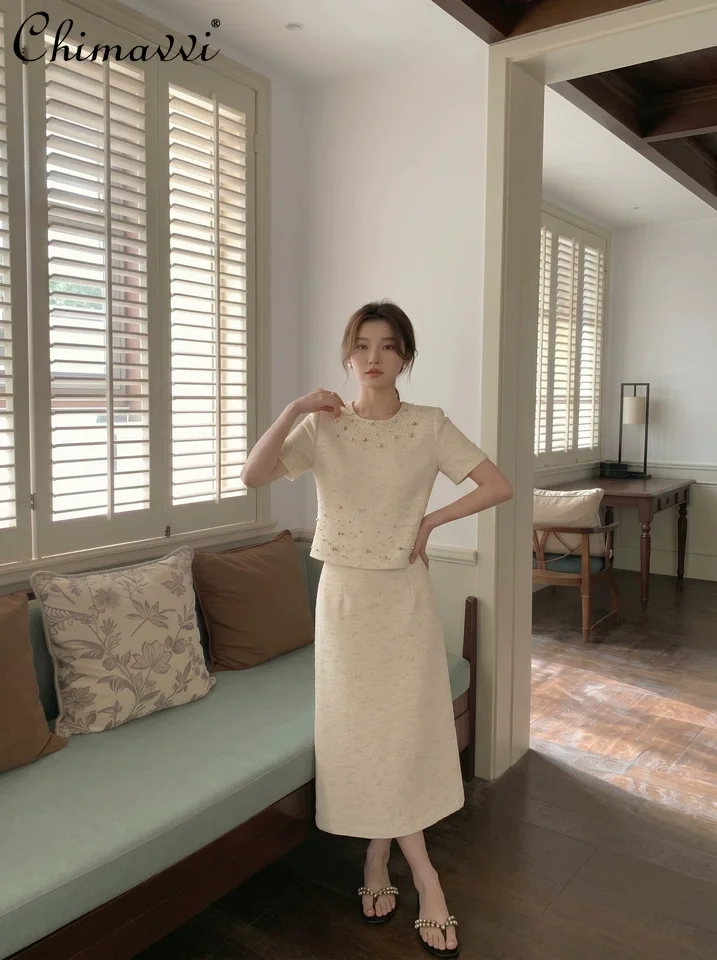 French Fashion Skirt Suit Women's Summer New Luxury Classy Round Neck Short Sleeve Tops Skirt Elegant Office Lady Two-piece Set
French Fashion Skirt Suit Women's Summer New Luxury Classy Round Neck Short Sleeve Tops Skirt Elegant Office Lady Two-piece Set