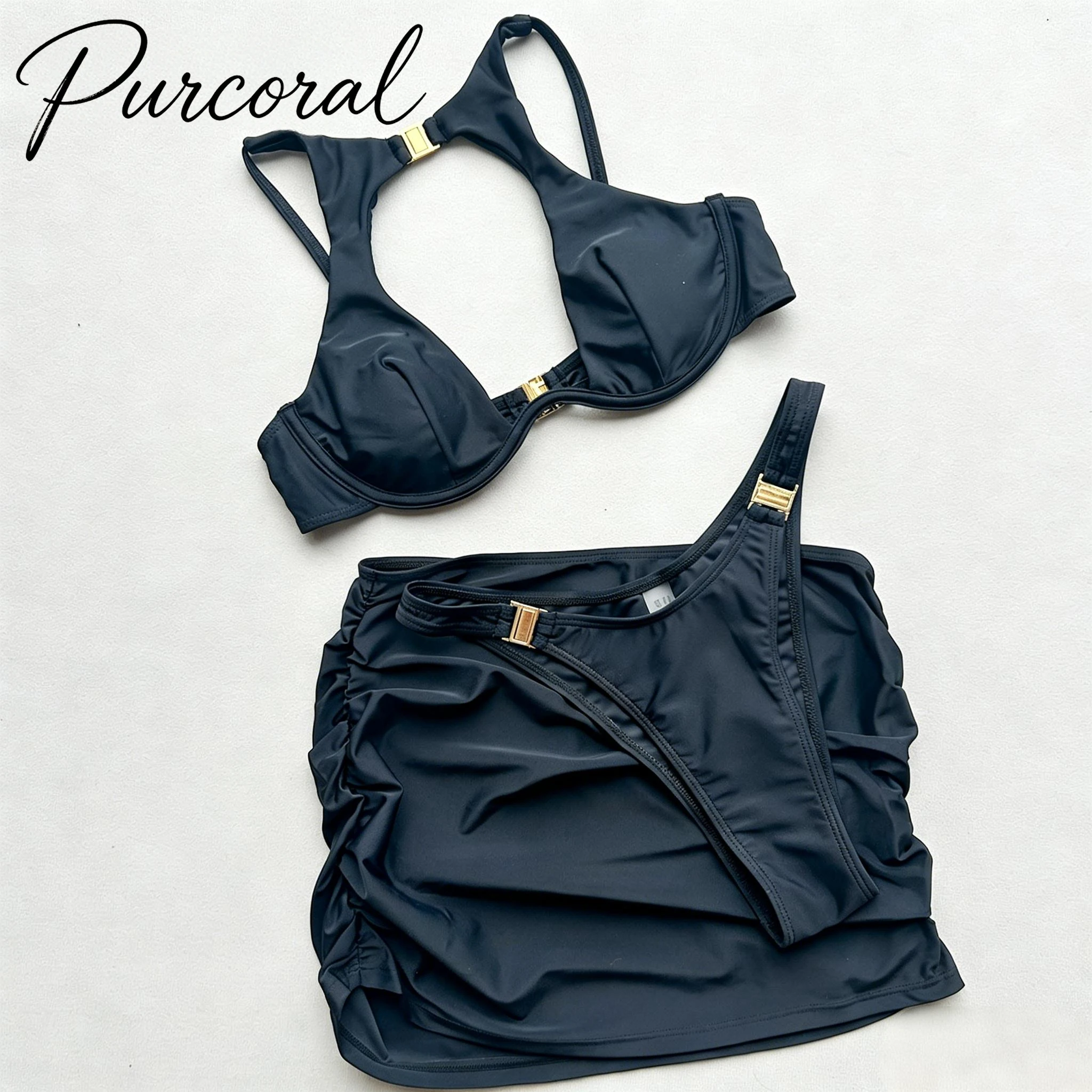 Purcoral 2026 Nylon 3 Piece Bikini Set Halter Underwire Top Metal Buckle Ruched Mini Skirt Thong Swimwear Beach Bathing Suit
Purcoral 2026 Nylon 3 Piece Bikini Set Halter Underwire Top Metal Buckle Ruched Mini Skirt Thong Swimwear Beach Bathing Suit