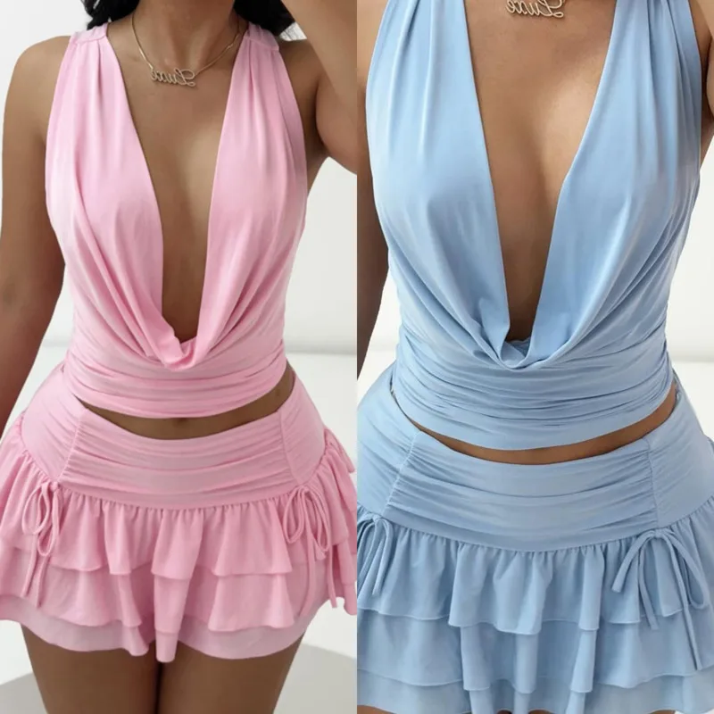 Trendy Hollowed Out Crop Top With A Dangling Collar And Straps Tied Lace-up Pleated Cake-style Elastic Mini Skirt Sexy Women Set
Trendy Hollowed Out Crop Top With A Dangling Collar And Straps Tied Lace-up Pleated Cake-style Elastic Mini Skirt Sexy Women Set