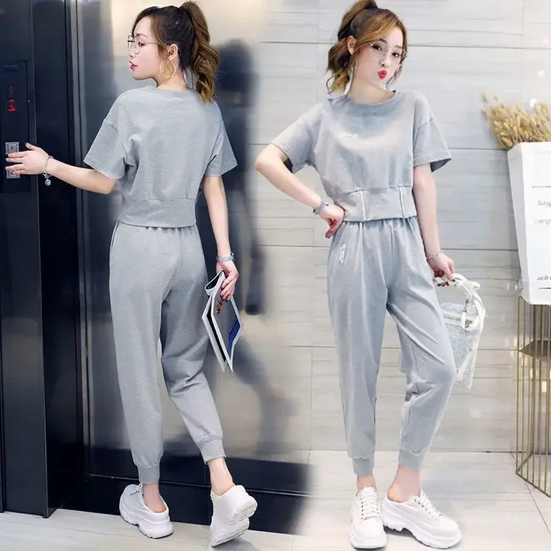 Women's Casual Clothing suit Sportswear Spring Summer New Round Collar Short Sleeves Tops T-shirt Capris Pants 2 Two Piece Sets
Women's Casual Clothing suit Sportswear Spring Summer New Round Collar Short Sleeves Tops T-shirt Capris Pants 2 Two Piece Sets