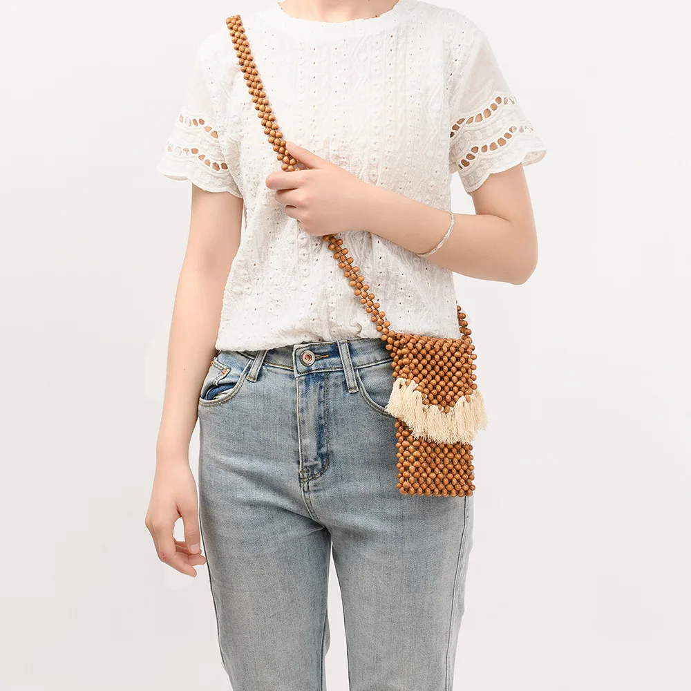 Minimally Casual Tassel Design Wooden Bead Ladies Totebag Hand Woven Women's Bags Beach Vacation Travel Crossbody Shoulder Bag
Minimally Casual Tassel Design Wooden Bead Ladies Totebag Hand Woven Women's Bags Beach Vacation Travel Crossbody Shoulder Bag