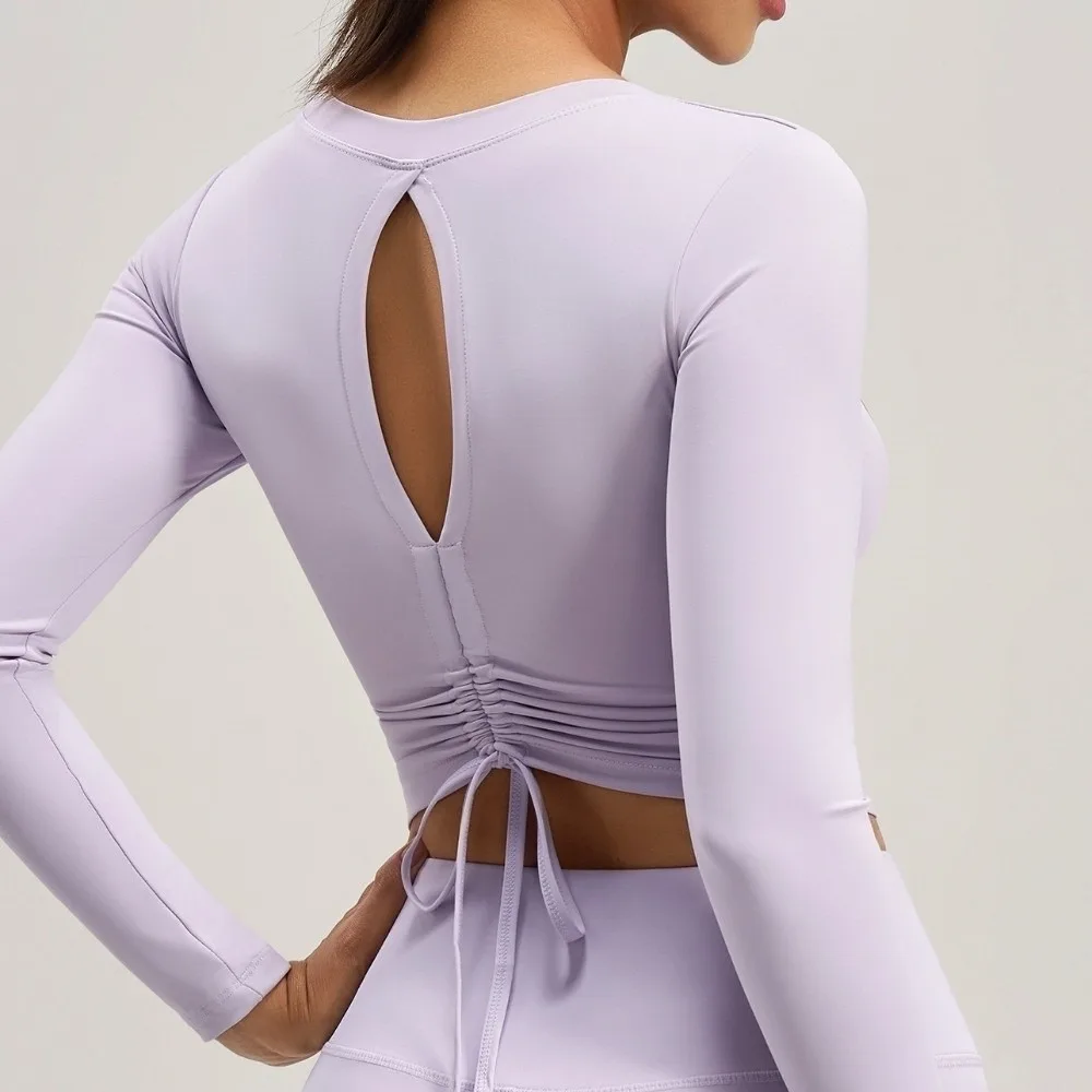 Ruffled Fit Back Drawstring Sportswear with Chest Pad Long Sleeve Fitness Yoga Top Elastic Breathable Pilates Yoga Shirts Female
Ruffled Fit Back Drawstring Sportswear with Chest Pad Long Sleeve Fitness Yoga Top Elastic Breathable Pilates Yoga Shirts Female