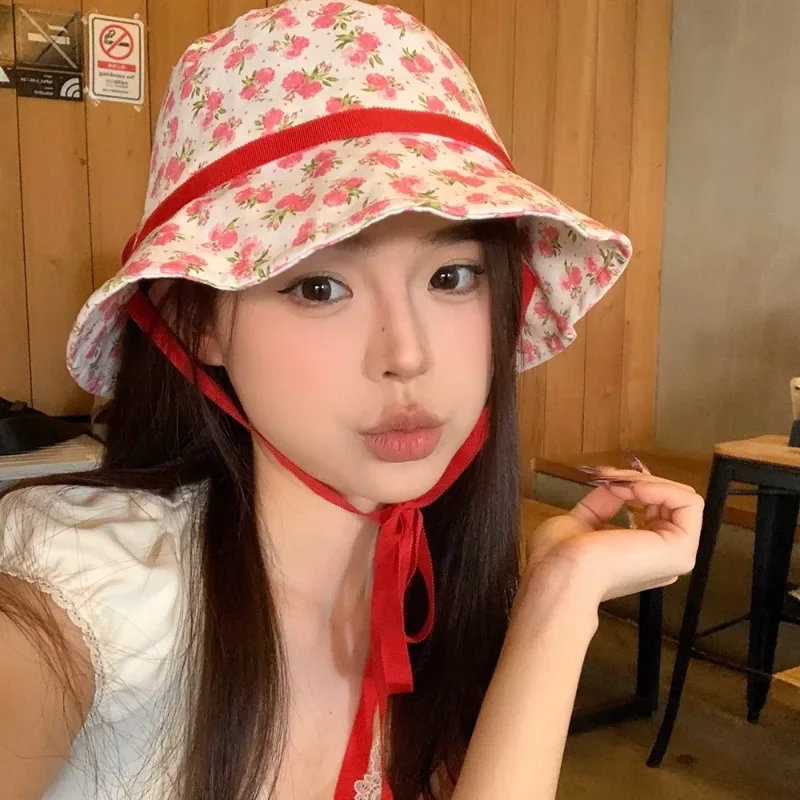 New Korean Version of The Sweet Flower Print Lace-up Bucket Hat for Women Summer Outdoor Vacation Big Eaves Sunshade Sun Cap
New Korean Version of The Sweet Flower Print Lace-up Bucket Hat for Women Summer Outdoor Vacation Big Eaves Sunshade Sun Cap